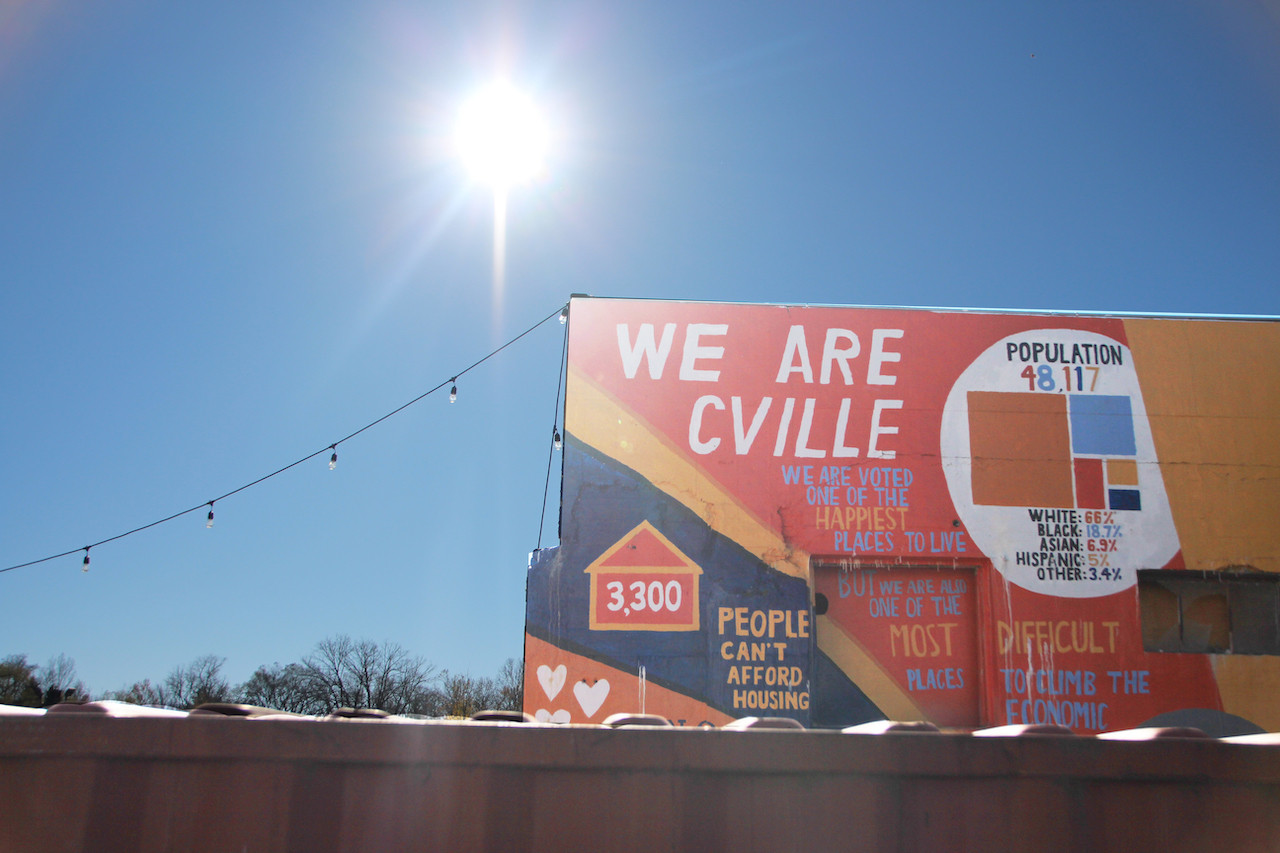 A mural reads "WE ARE CVILLE"